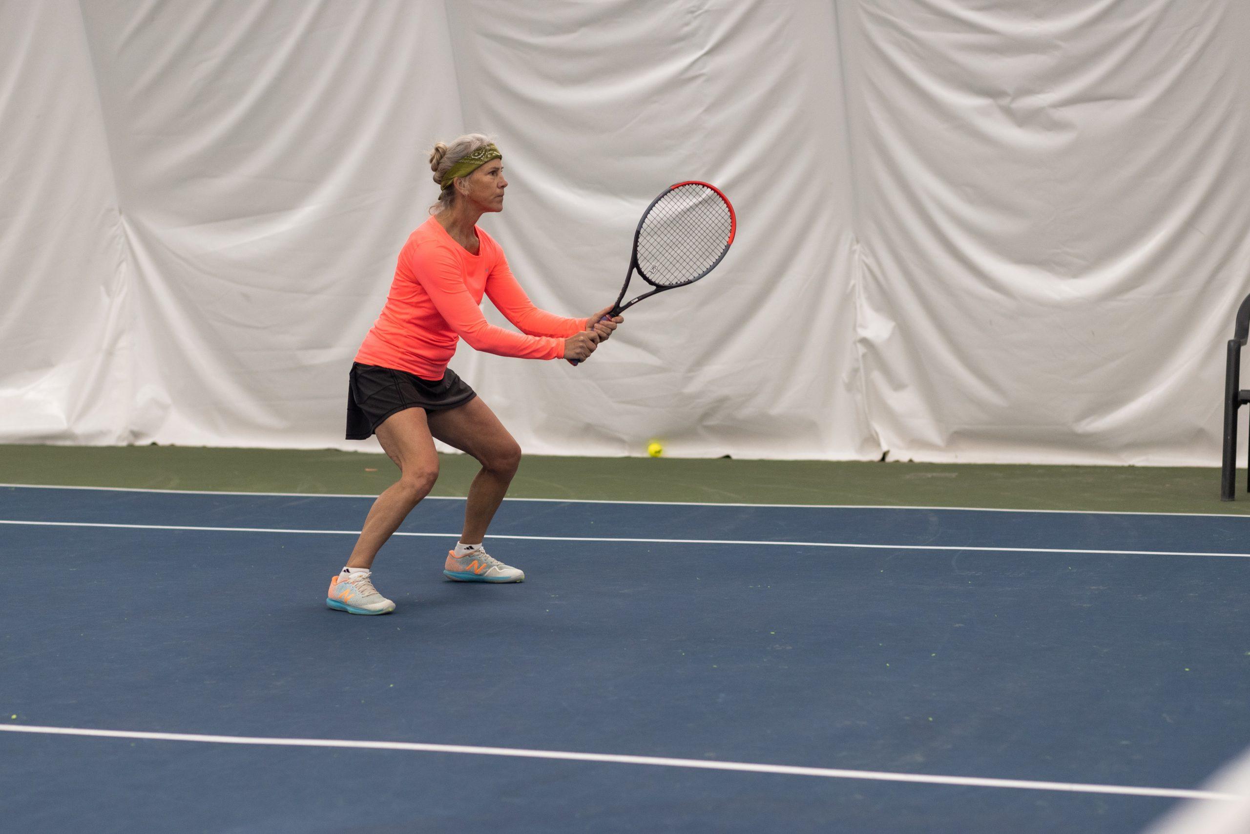 woman playing tennis 