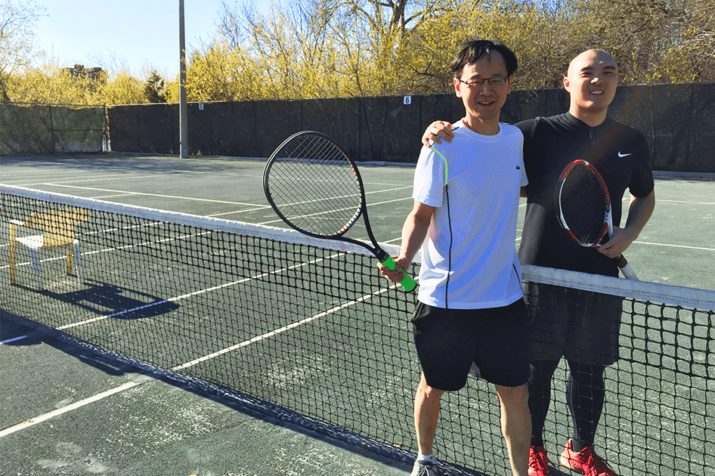 adults on a tennis courts