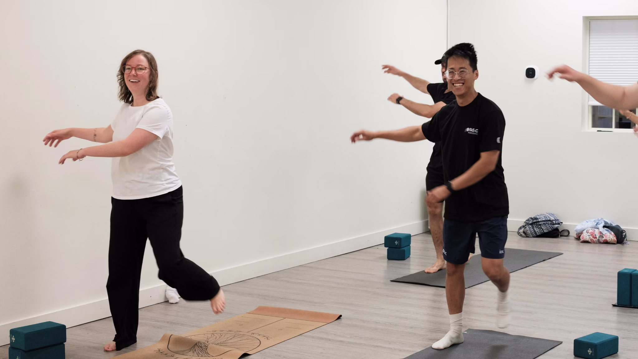 Picture of people smiling during a fitness class at rideau sports centre